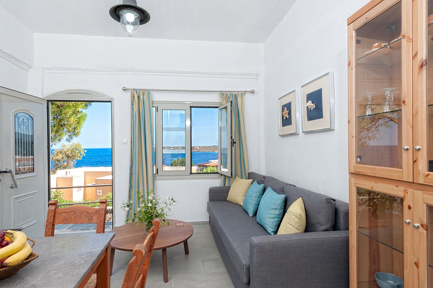 comfort suite, 2 bedrooms, sea view | living area | tv