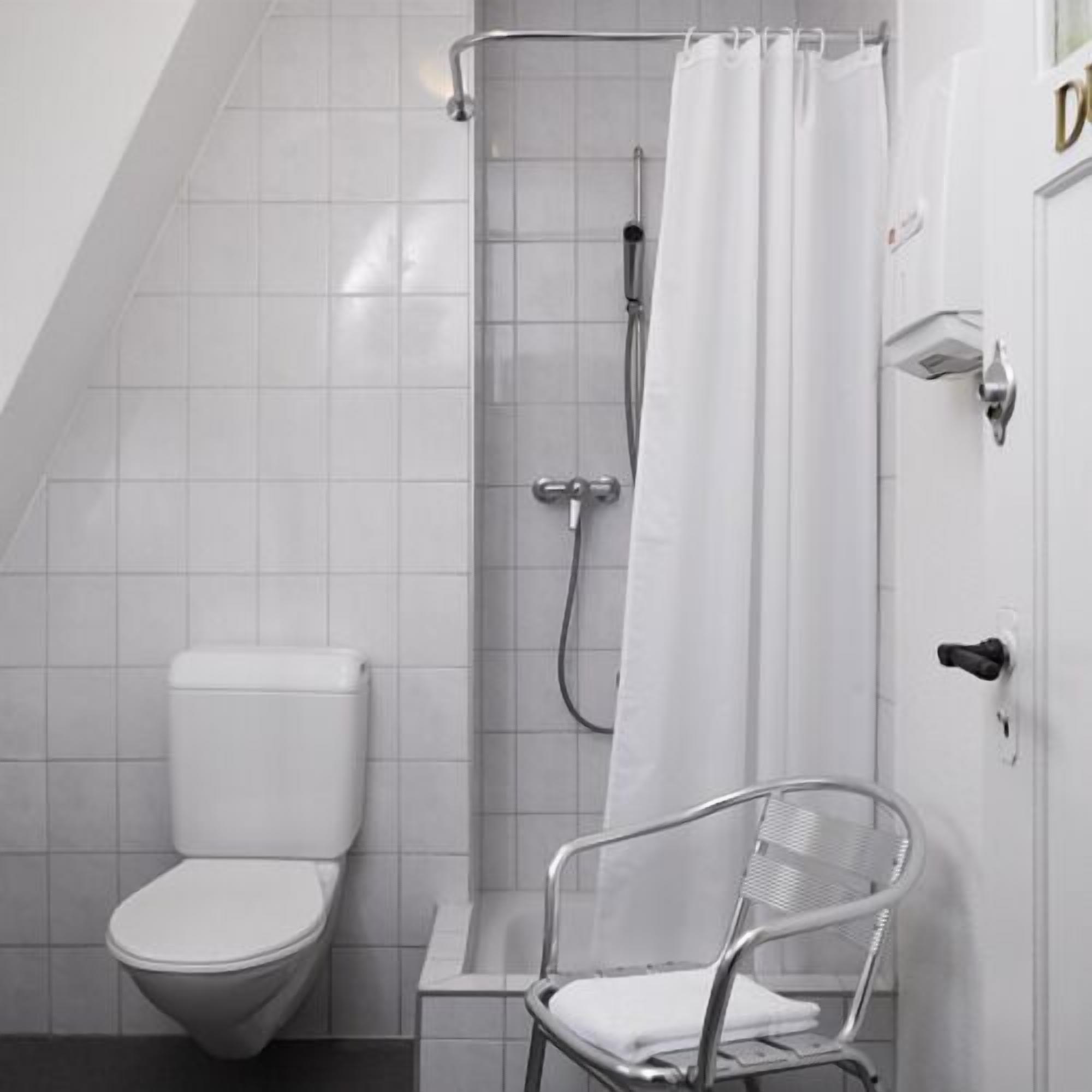 standard double or twin room, shared bathroom | bathroom | shower, free toiletries, hair dryer, towels