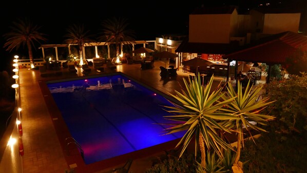 Seasonal outdoor pool, pool umbrellas, pool loungers