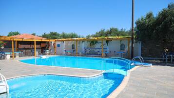 Outdoor pool, open 8:00 AM to 6:00 PM, sun loungers
