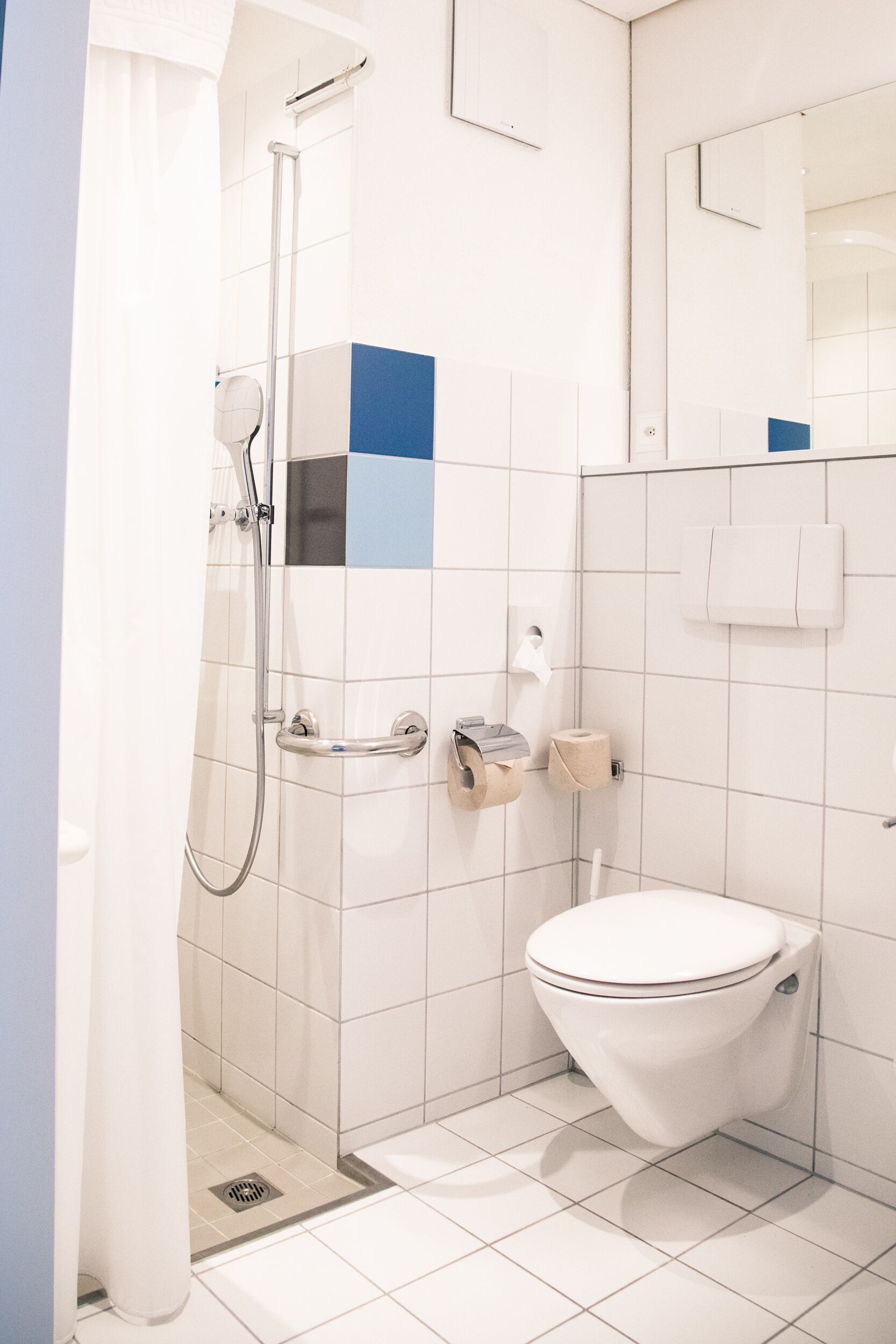 shower, free toiletries, hair dryer, slippers