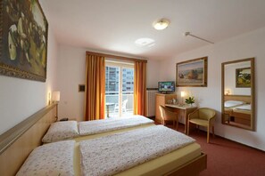 Luxe beddengoed, een minibar, een kluis op de kamer, een bureau