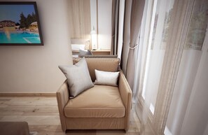 Coffres-forts dans les chambres, fer et planche à repasser