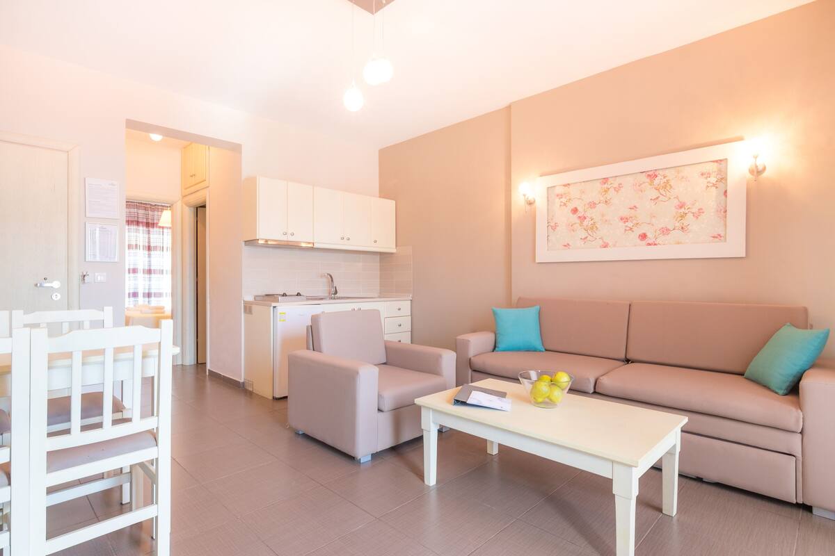 Appartement exécutif, 1 chambre | Aire de séjour | Téléviseur à écran plat