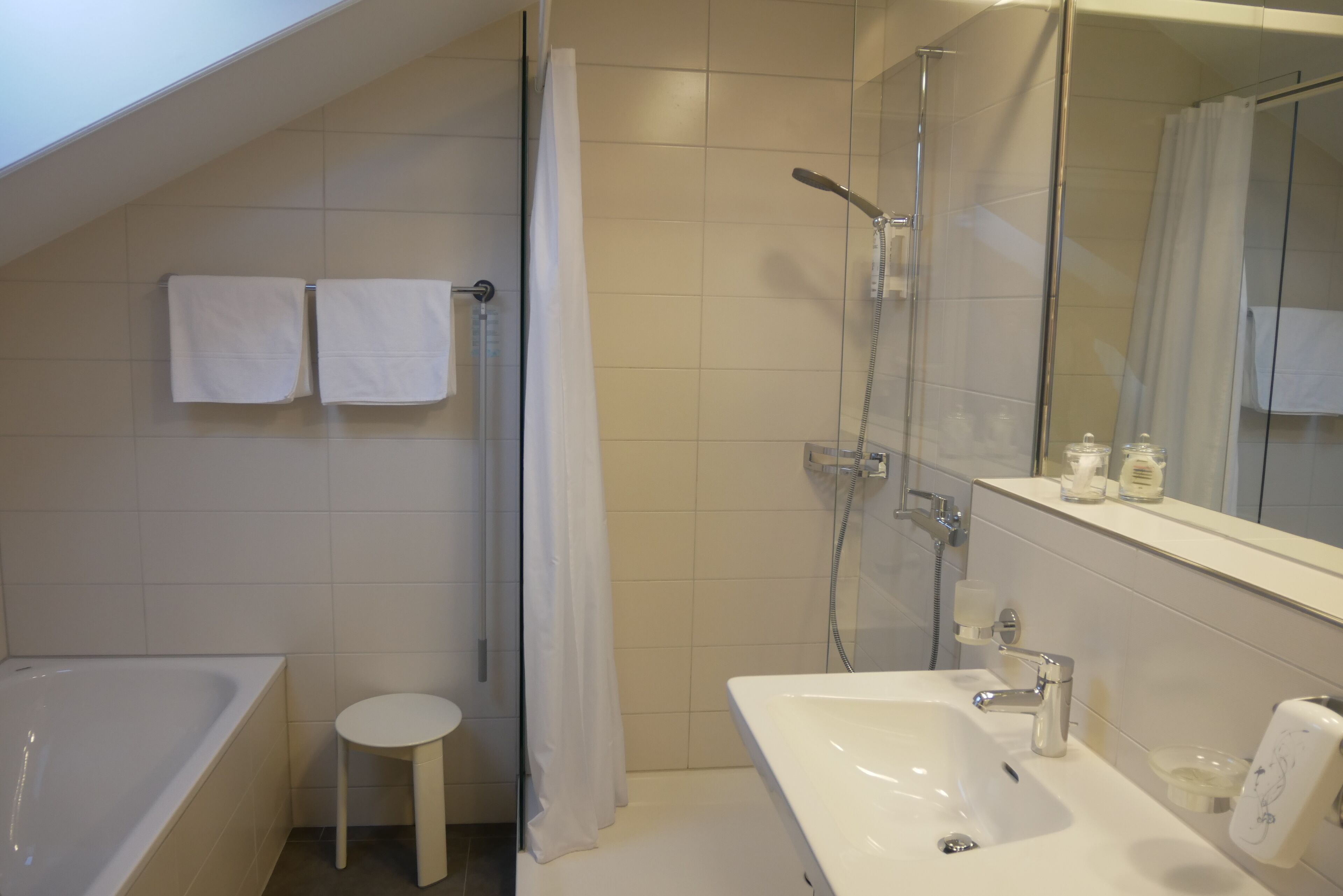 superior double room | bathroom | hair dryer, slippers, towels, soap