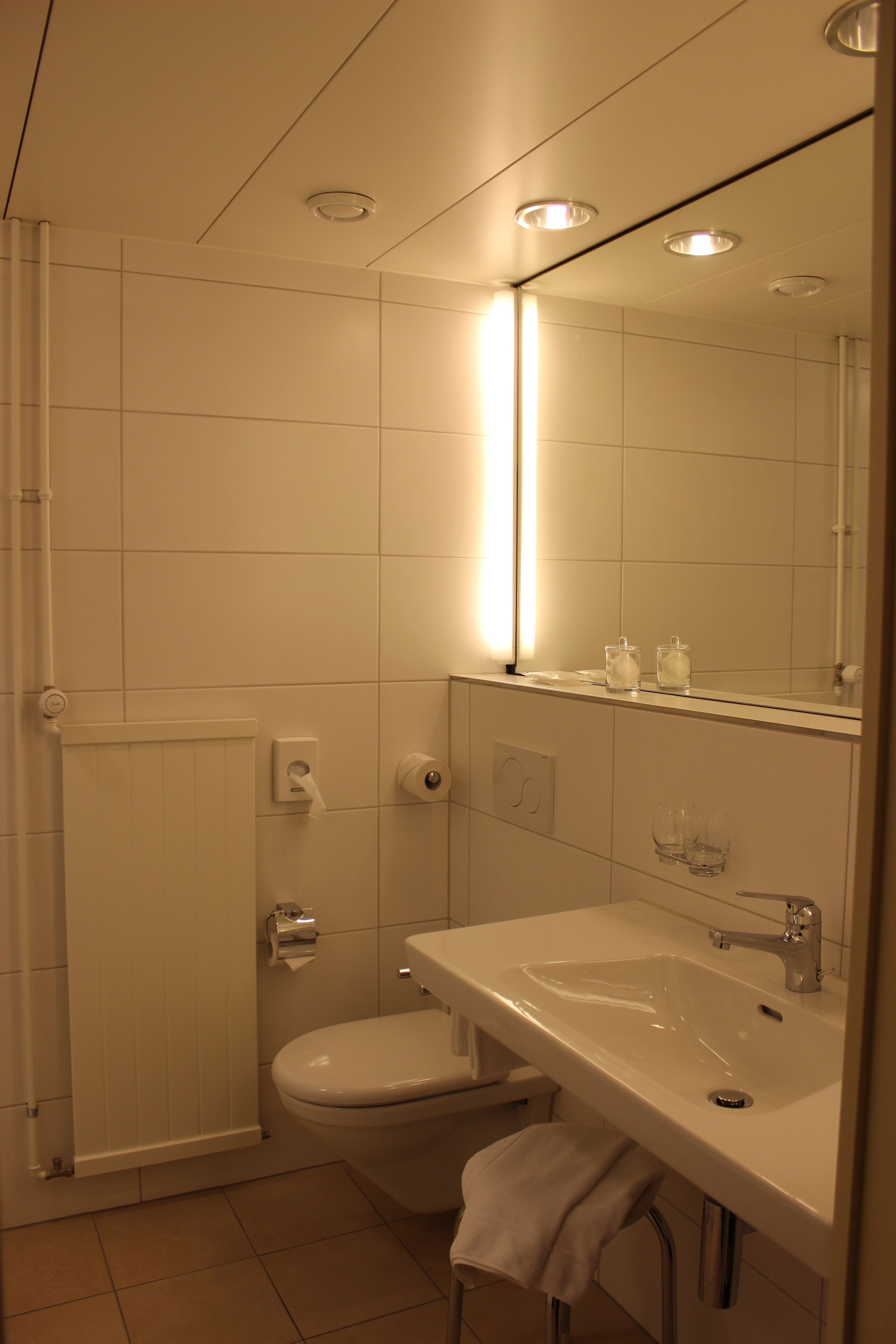 hair dryer, slippers, towels, soap