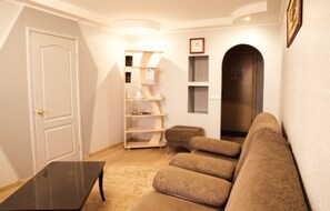 Suite, 1 Bedroom | Living area | Flat-screen TV, books - Ussuriysk Hotel (Ussuriysk)