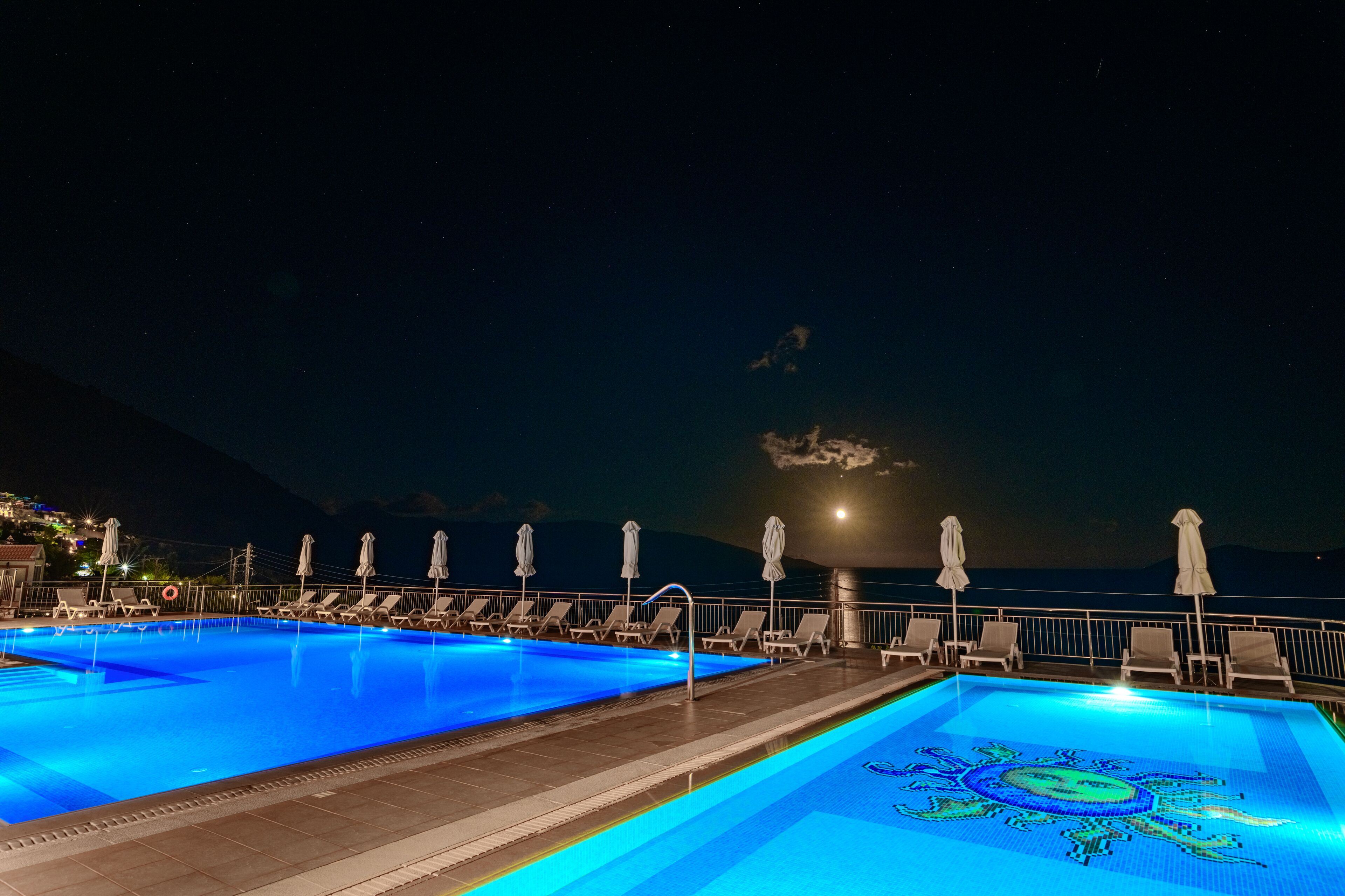 2 outdoor pools, open 9:00 AM to 7:00 PM, pool umbrellas, sun loungers