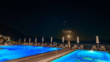 2 outdoor pools, open 9:00 AM to 7:00 PM, pool umbrellas, sun loungers