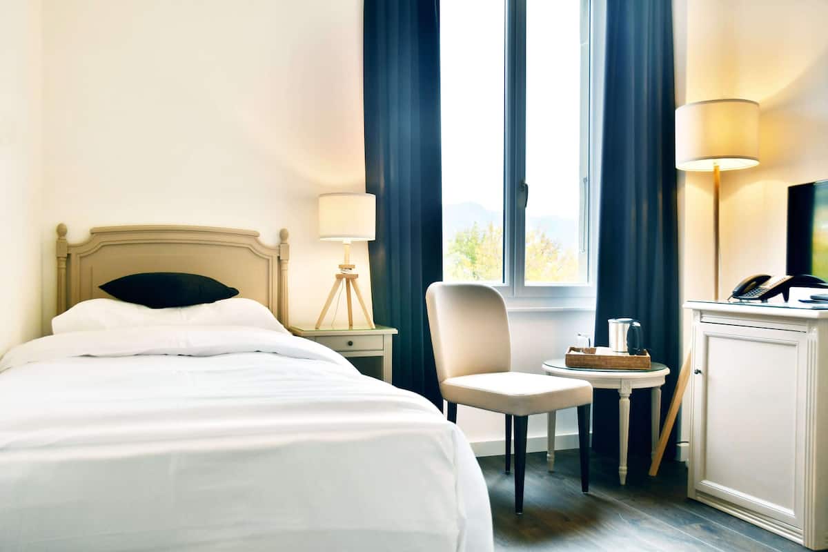 Chambre Simple | Literie de qualité supérieure, articles gratuits dans le mini-bar