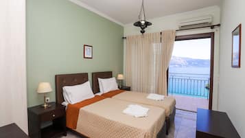 Apartamento, 2 quartos, vista para o mar | Cofres nos quartos, quartos à prova de som, Wi-Fi de cortesia