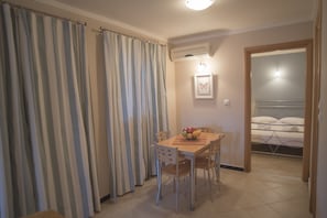 Apartment, Pool View | In-room safe, free cribs/infant beds, rollaway beds, free WiFi