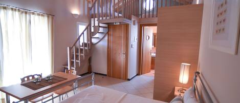 Family Studio, Pool View | In-room safe, free cots/infant beds, rollaway beds, free WiFi