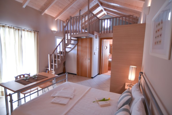 Family Studio, Pool View | In-room safe, free cribs/infant beds, rollaway beds, free WiFi