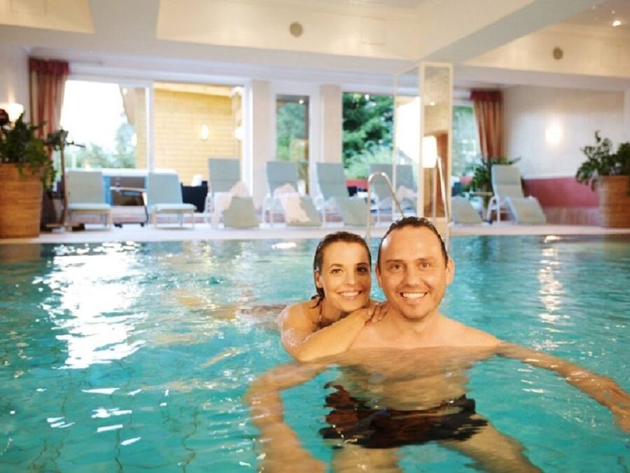 Indoor pool, open 7:00 AM to 10:00 PM, pool loungers
