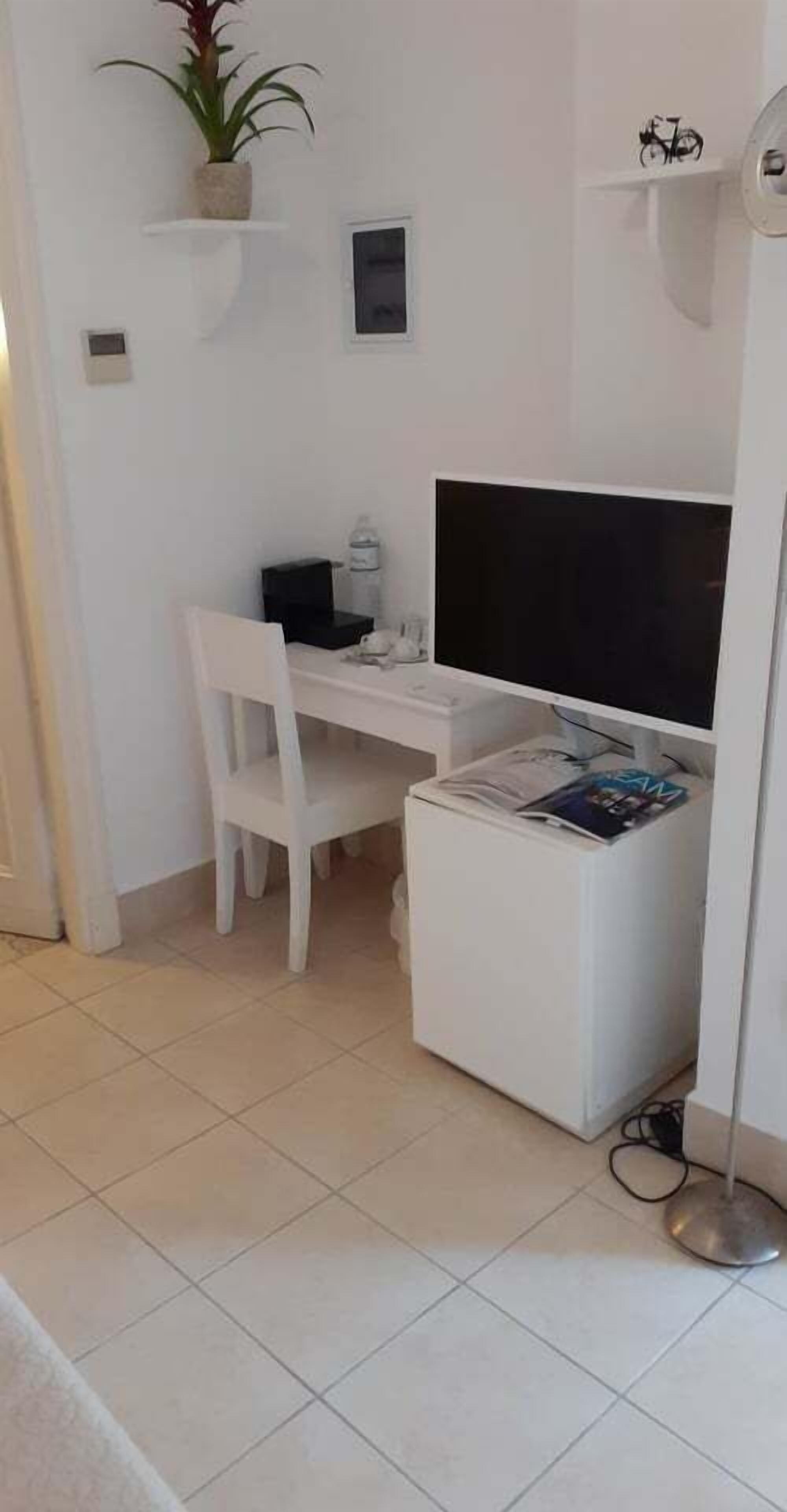 traditional family room | 1 bedroom, frette italian sheets, premium bedding, pillow-top beds