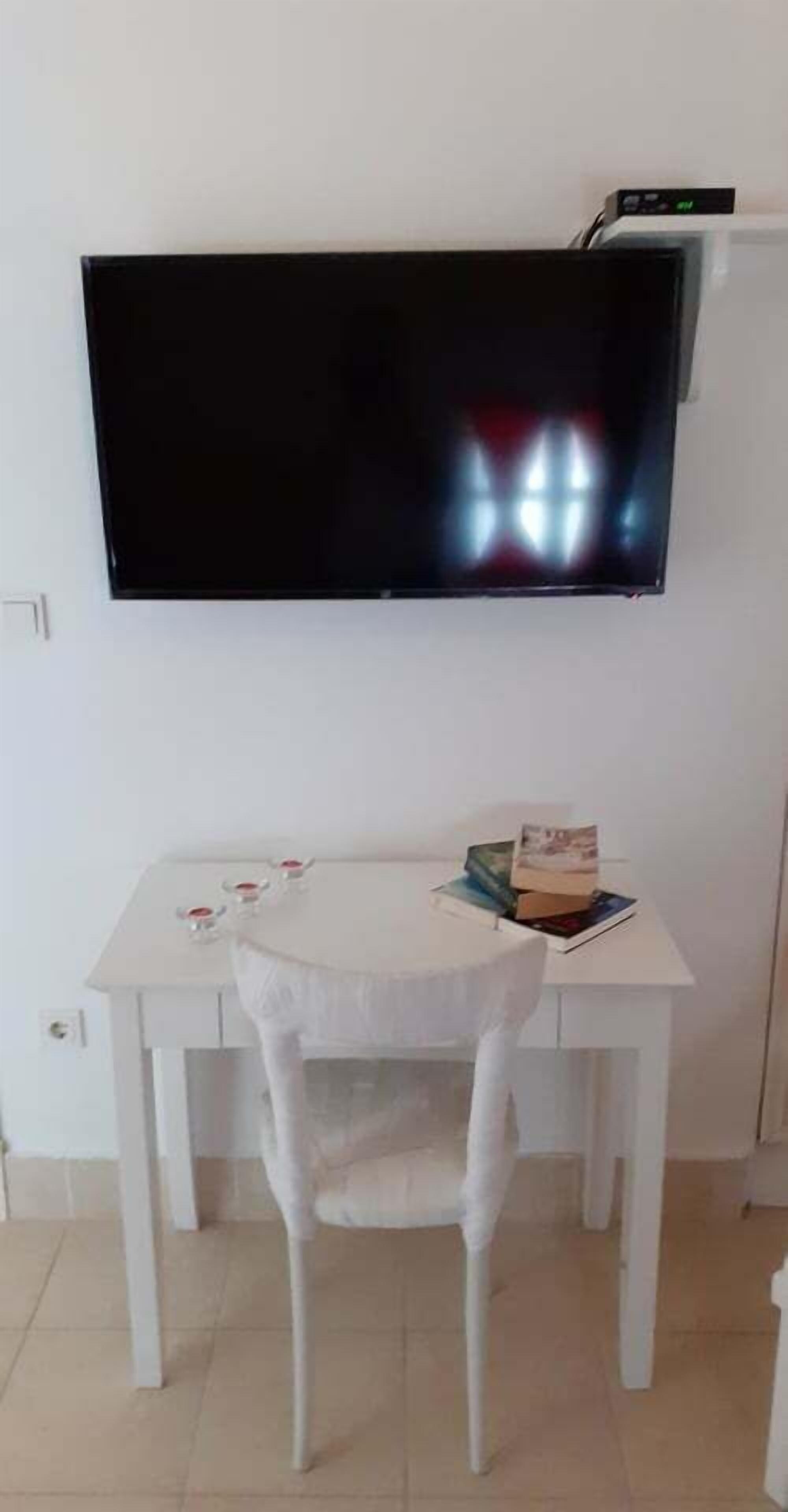 traditional family room | 1 bedroom, frette italian sheets, premium bedding, pillow-top beds