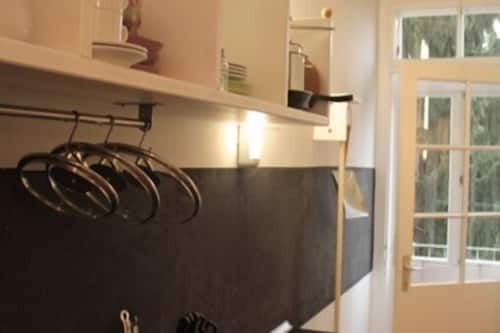 Design Apartment, 1 Bedroom, Balcony, Garden View | Private kitchen | Full-size fridge, oven, stovetop, dishwasher