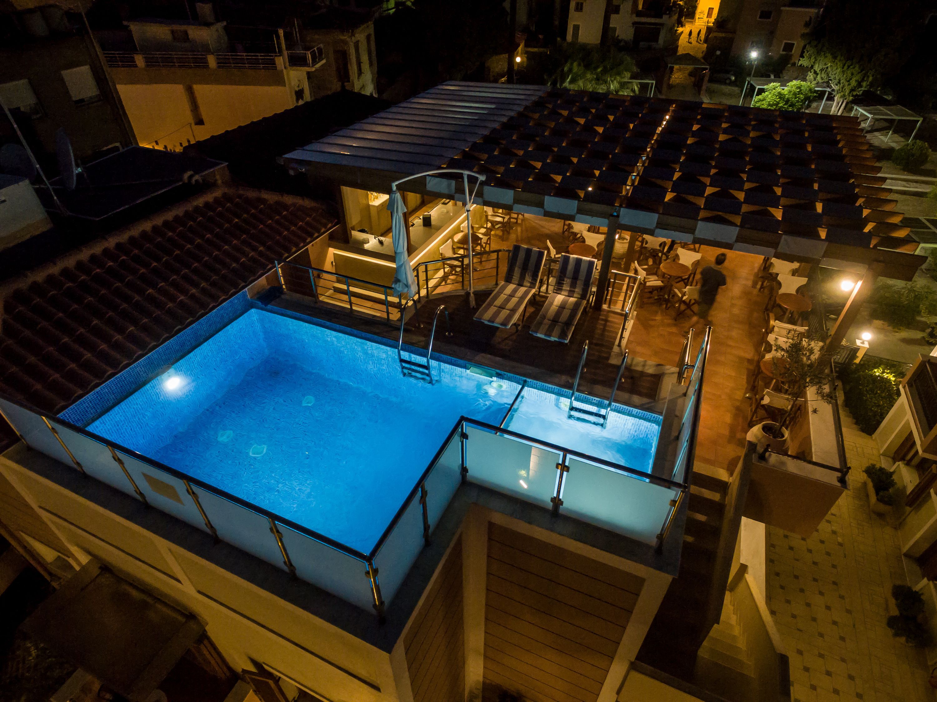 seasonal outdoor pool, open 9:00 am to 9:00 pm, pool umbrellas