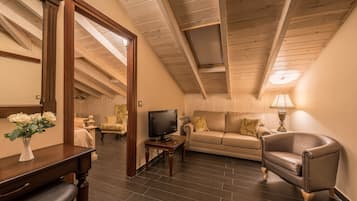 Superior Suite, Sauna | Living room | 32-inch flat-screen TV with satellite channels, TV