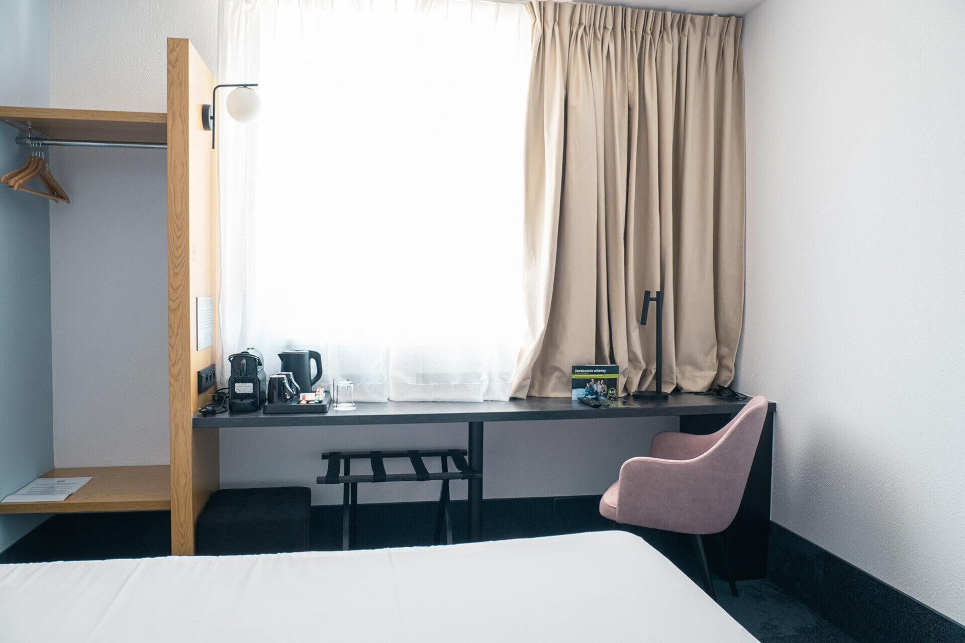 Desk, blackout curtains, soundproofing, free cots/infant beds
