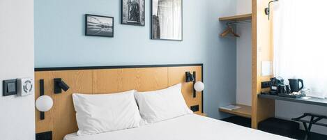 Desk, blackout drapes, soundproofing, free cribs/infant beds