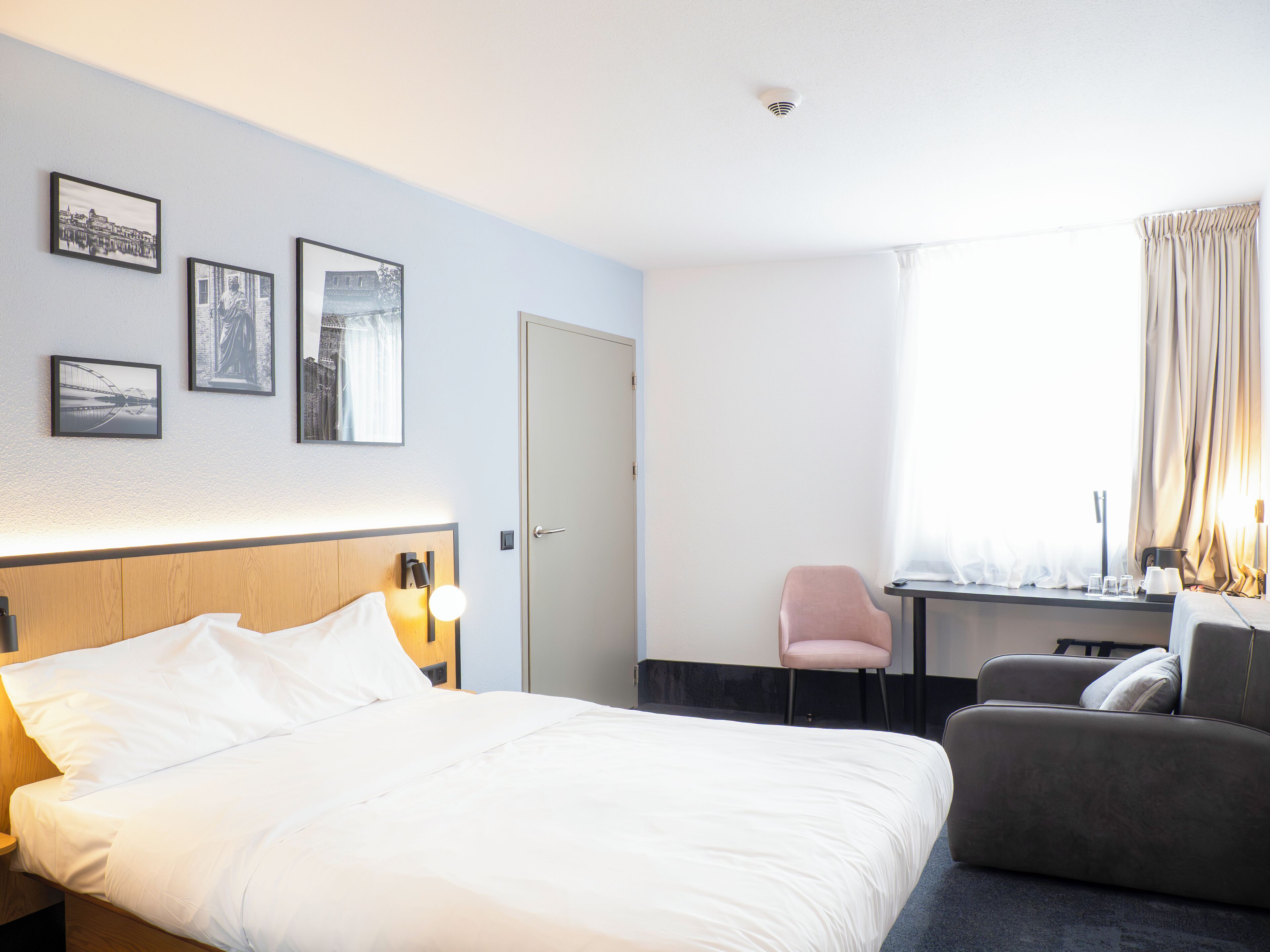 Desk, blackout drapes, soundproofing, free cribs/infant beds