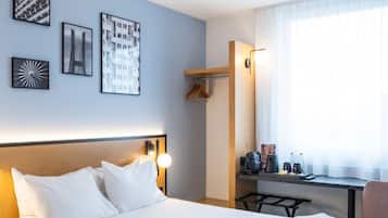 Desk, blackout drapes, soundproofing, free cribs/infant beds