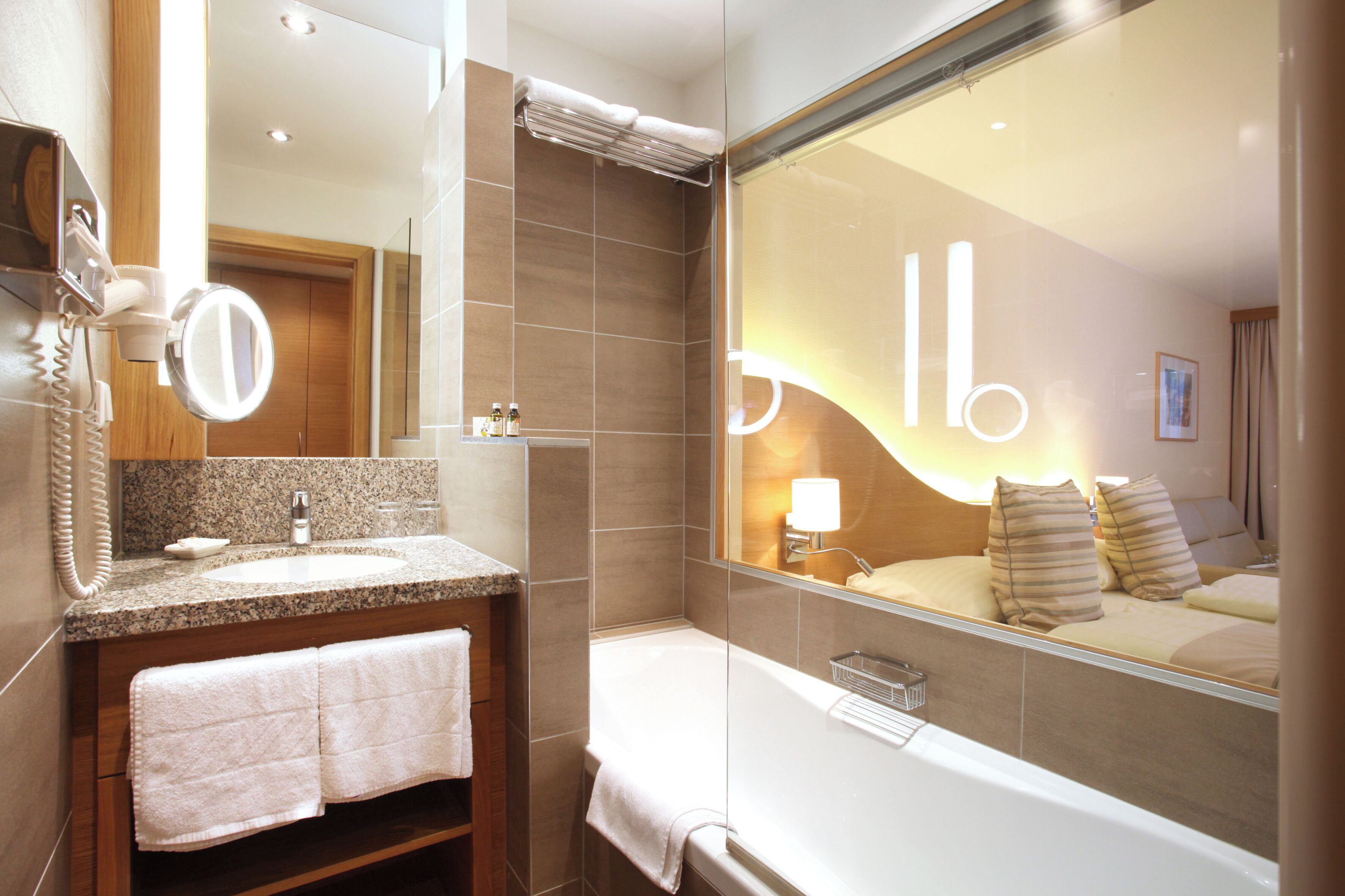 comfort quadruple room, balcony, garden view | bathroom | hair dryer, bathrobes, slippers, towels