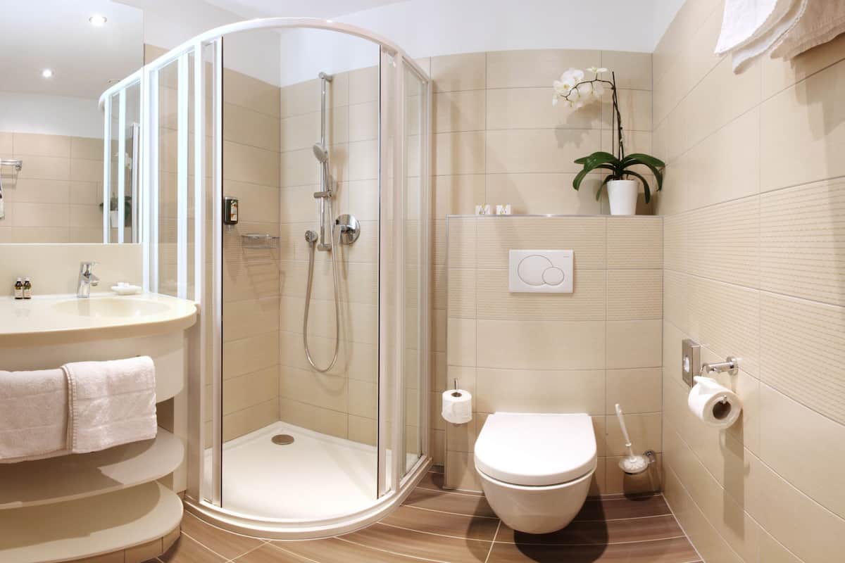 hair dryer, bathrobes, slippers, towels