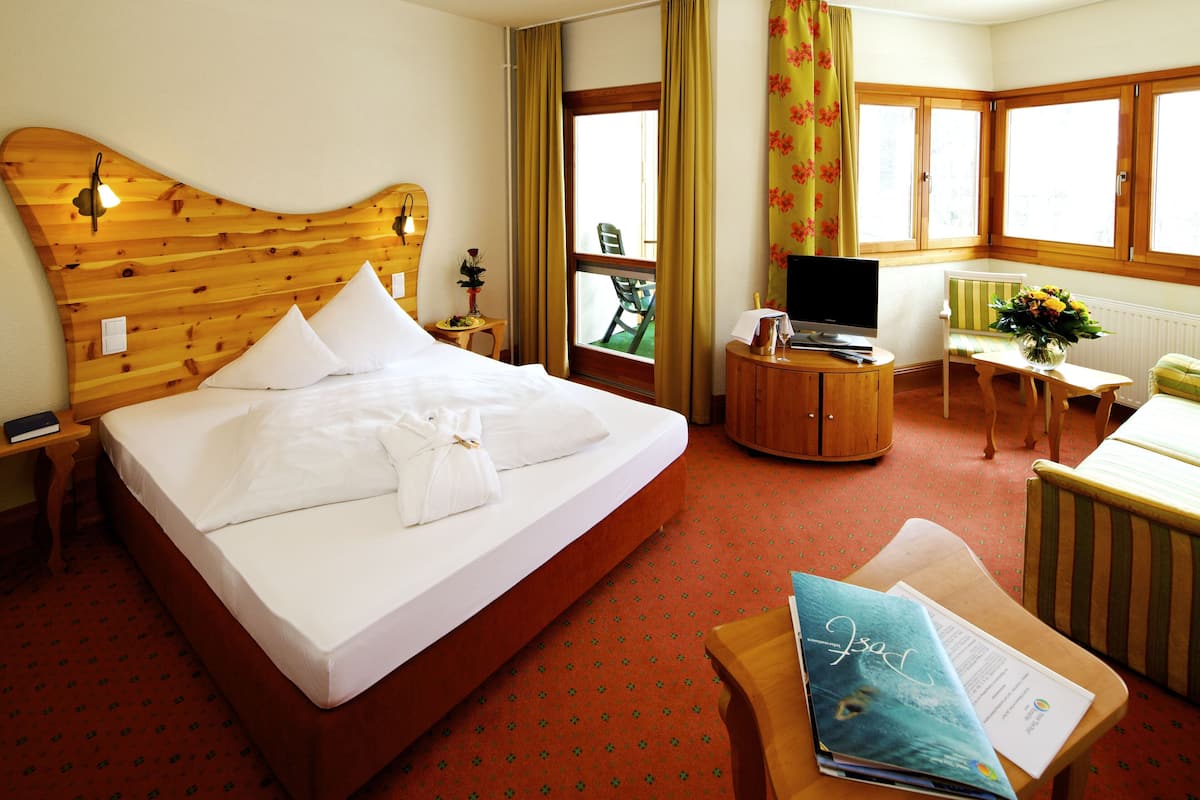 Deluxe eenpersoonskamer | 1 slaapkamer, een minibar, een kluis op de kamer, gratis wifi