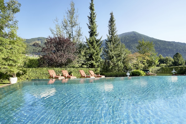 Indoor pool, outdoor pool, open 7:00 AM to 8:00 PM, pool umbrellas