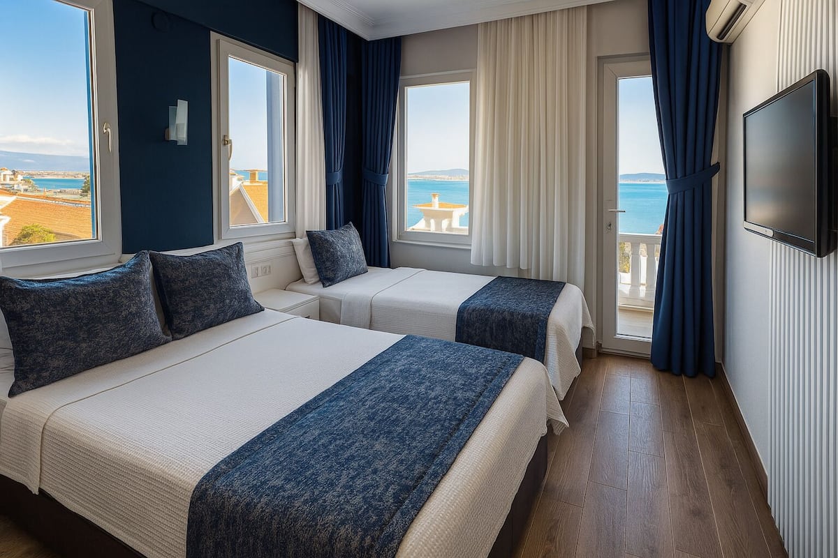 Standard Triple Room, Multiple Beds, Sea View | Premium bedding, minibar, in-room safe, blackout curtains