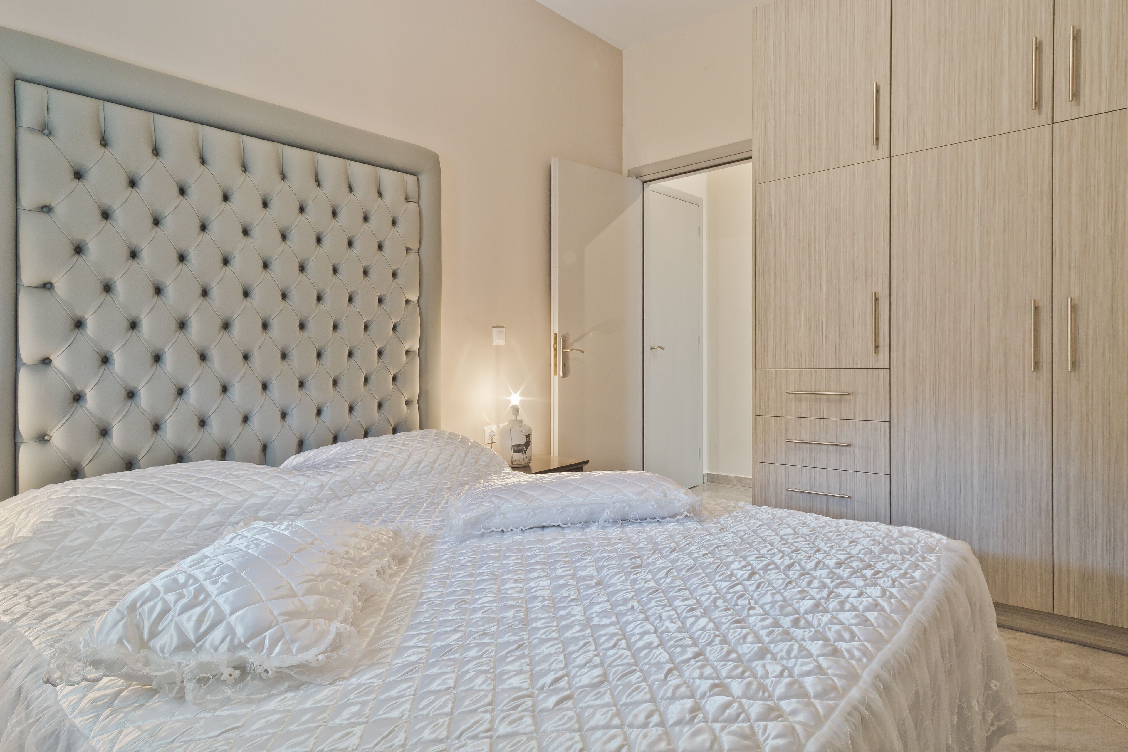 Luxury Apartment, Sea View, Ground Floor (Village View) | Iron/ironing board, cots/infant beds, free WiFi, bed sheets