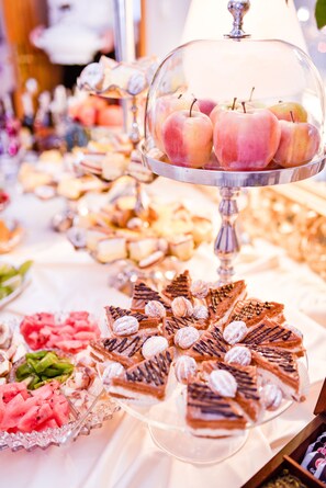 A buffet table with various desserts and fruits. - Villa la Val (Kamienna Gora)