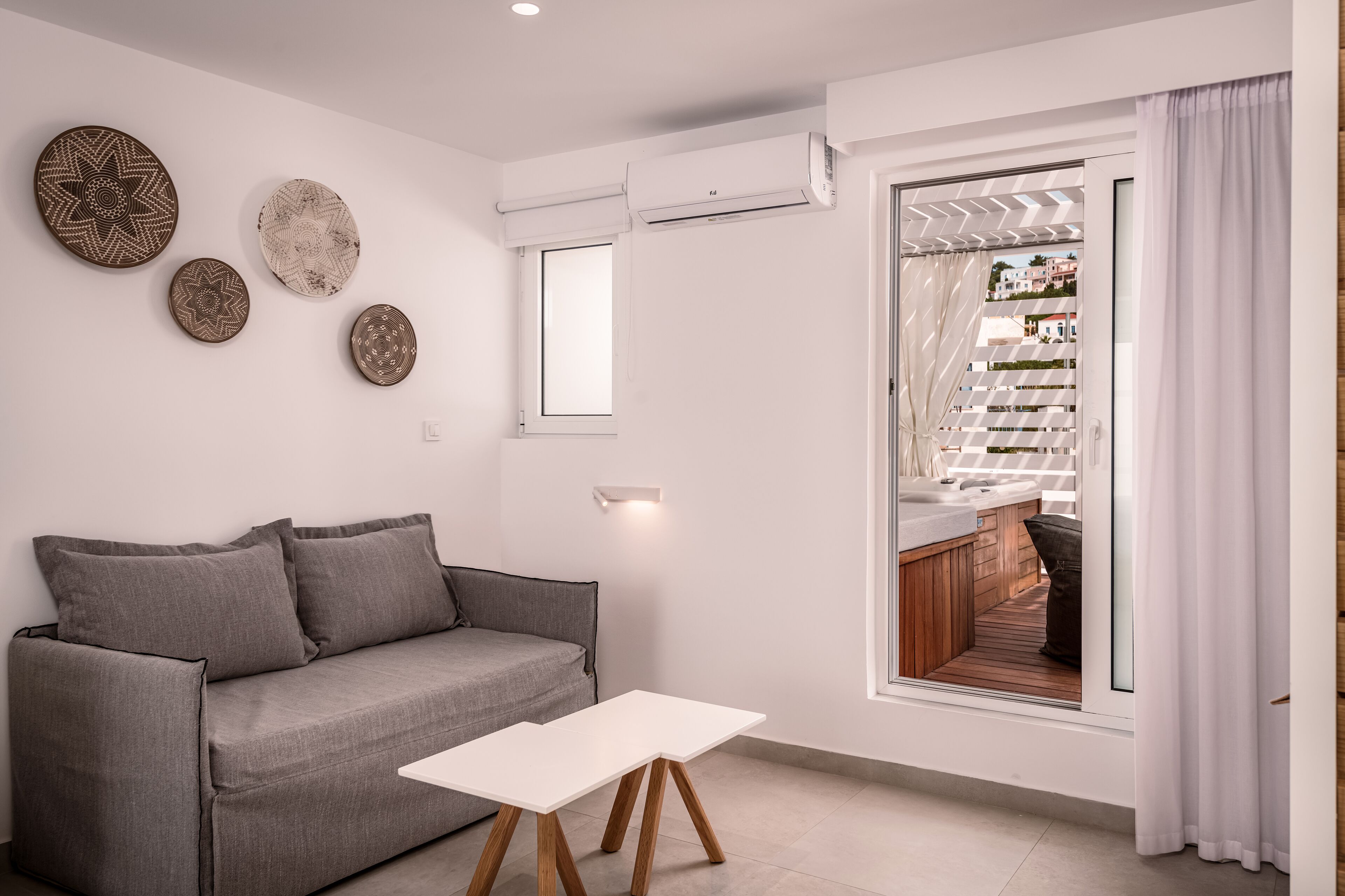 junior suite, sea view with outdoor jacuzzi | living area | lcd tv