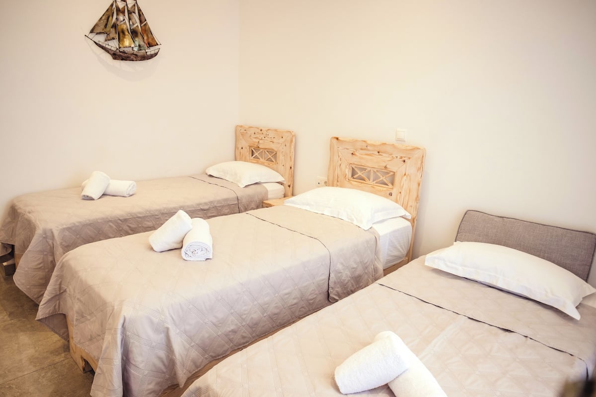 Triple Room | In-room safe, blackout drapes, iron/ironing board (on request)