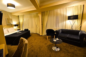 Suite, Corner | Premium bedding, free minibar items, in-room safe, soundproofing