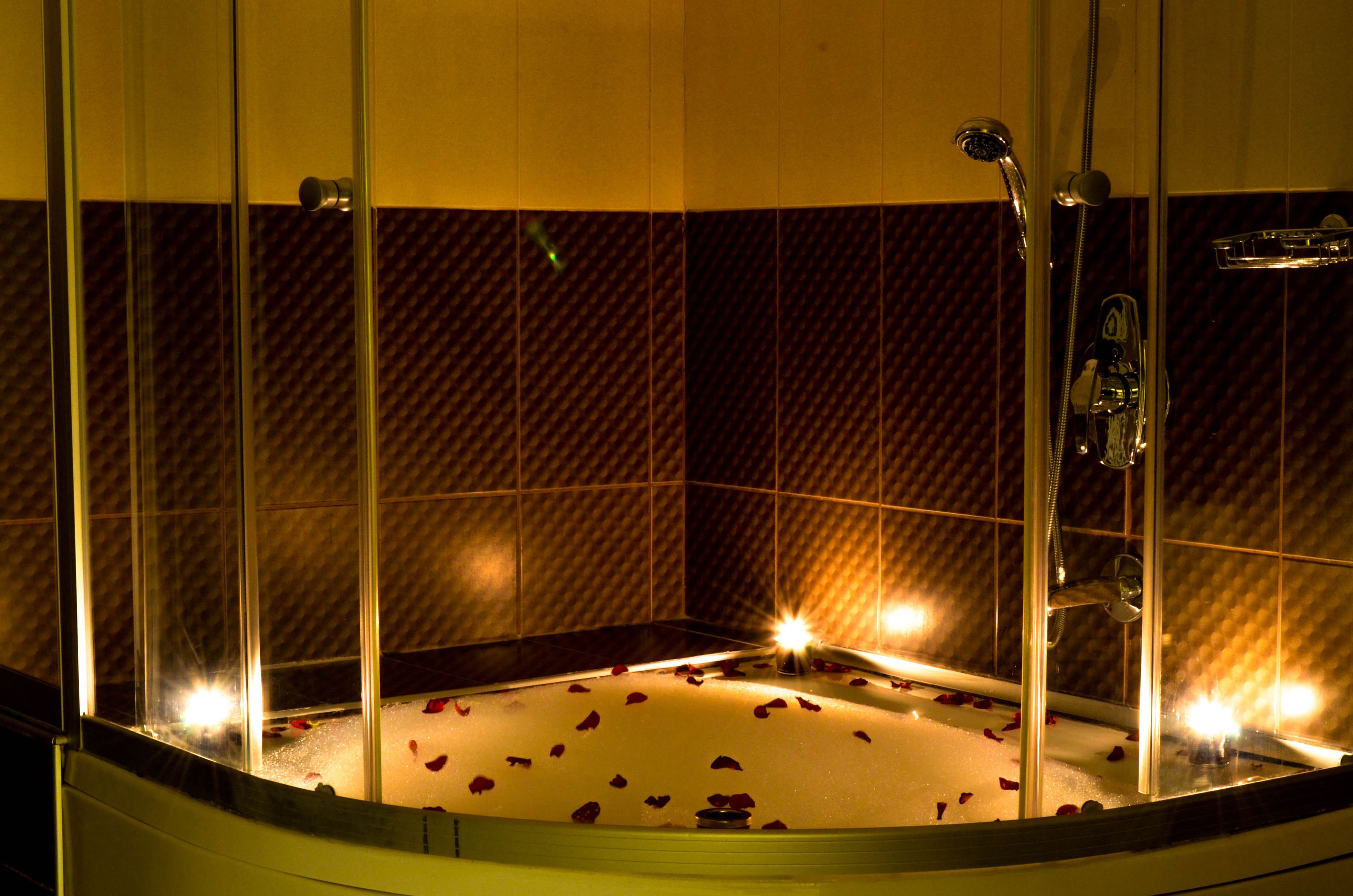 suite, jetted tub | bathroom | free toiletries, hair dryer, bathrobes, slippers