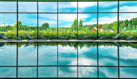 Indoor pool, seasonal outdoor pool, sun loungers, lifeguards on site