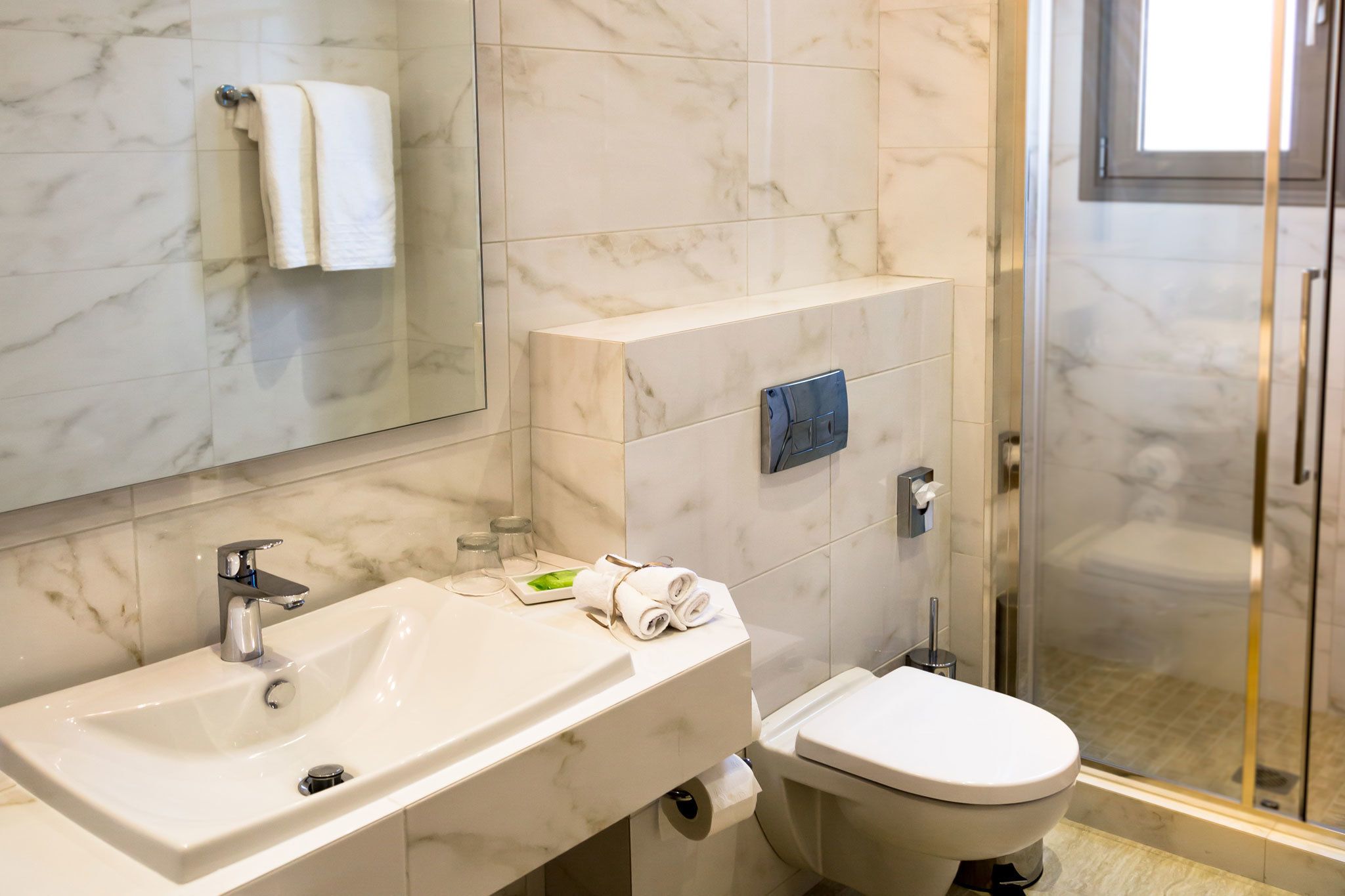 rainfall showerhead, free toiletries, hair dryer, bathrobes