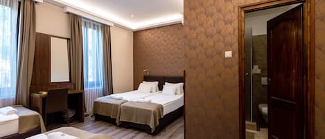 Standard Quadruple Room, Non Smoking | Memory foam beds, minibar, in-room safe, individually decorated