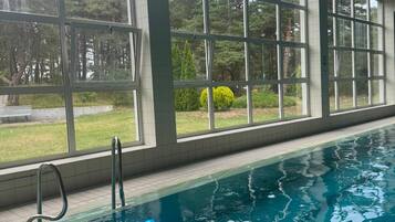 Indoor pool, open noon to 9:00 PM, lifeguards on site