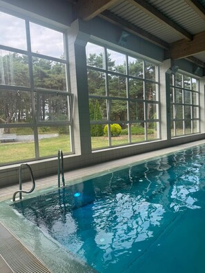Indoor pool, open noon to 9:00 PM, lifeguards on site