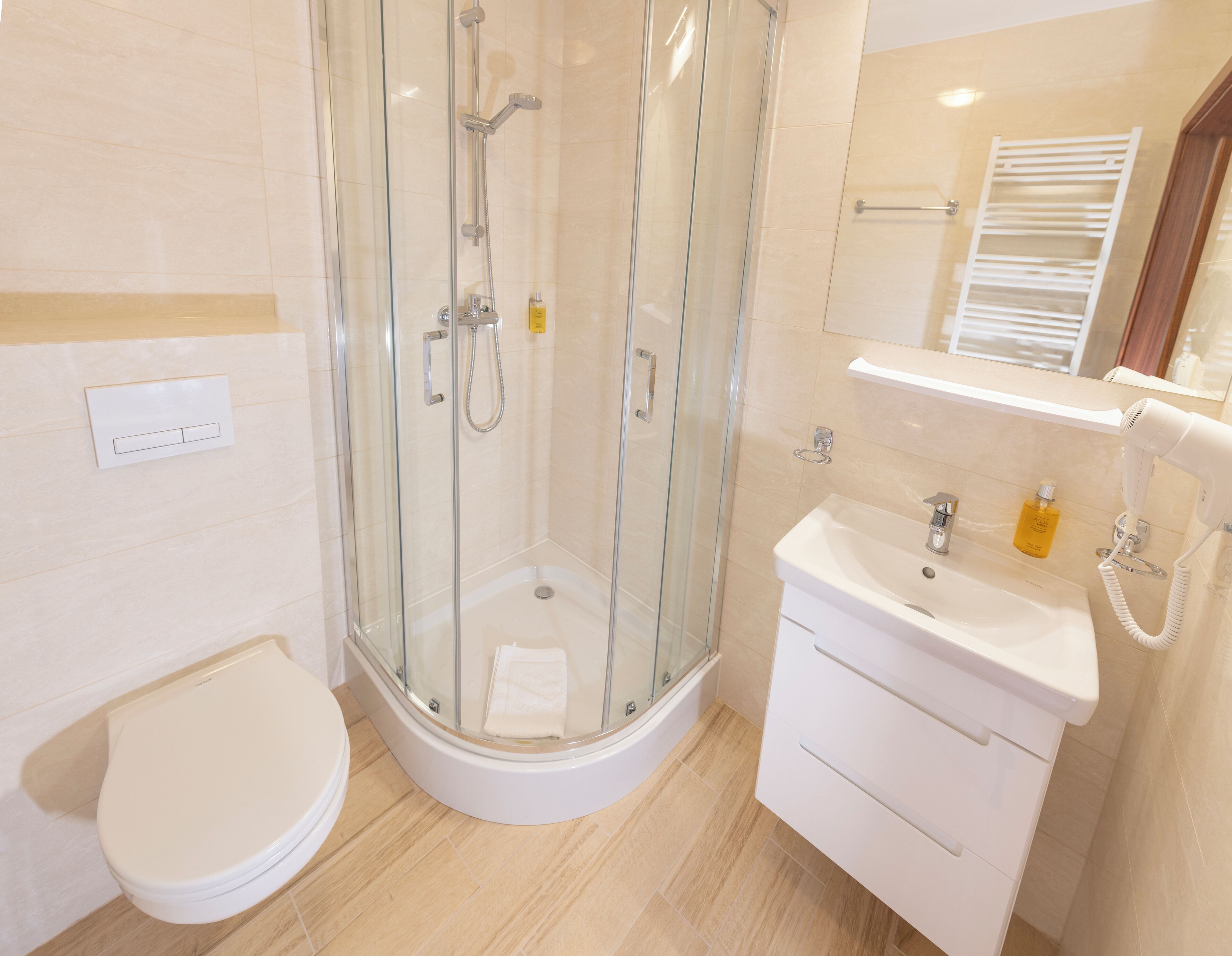 family room | bathroom | hair dryer, towels, soap, shampoo