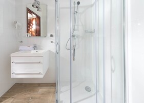 Hair dryer, towels, soap, shampoo
