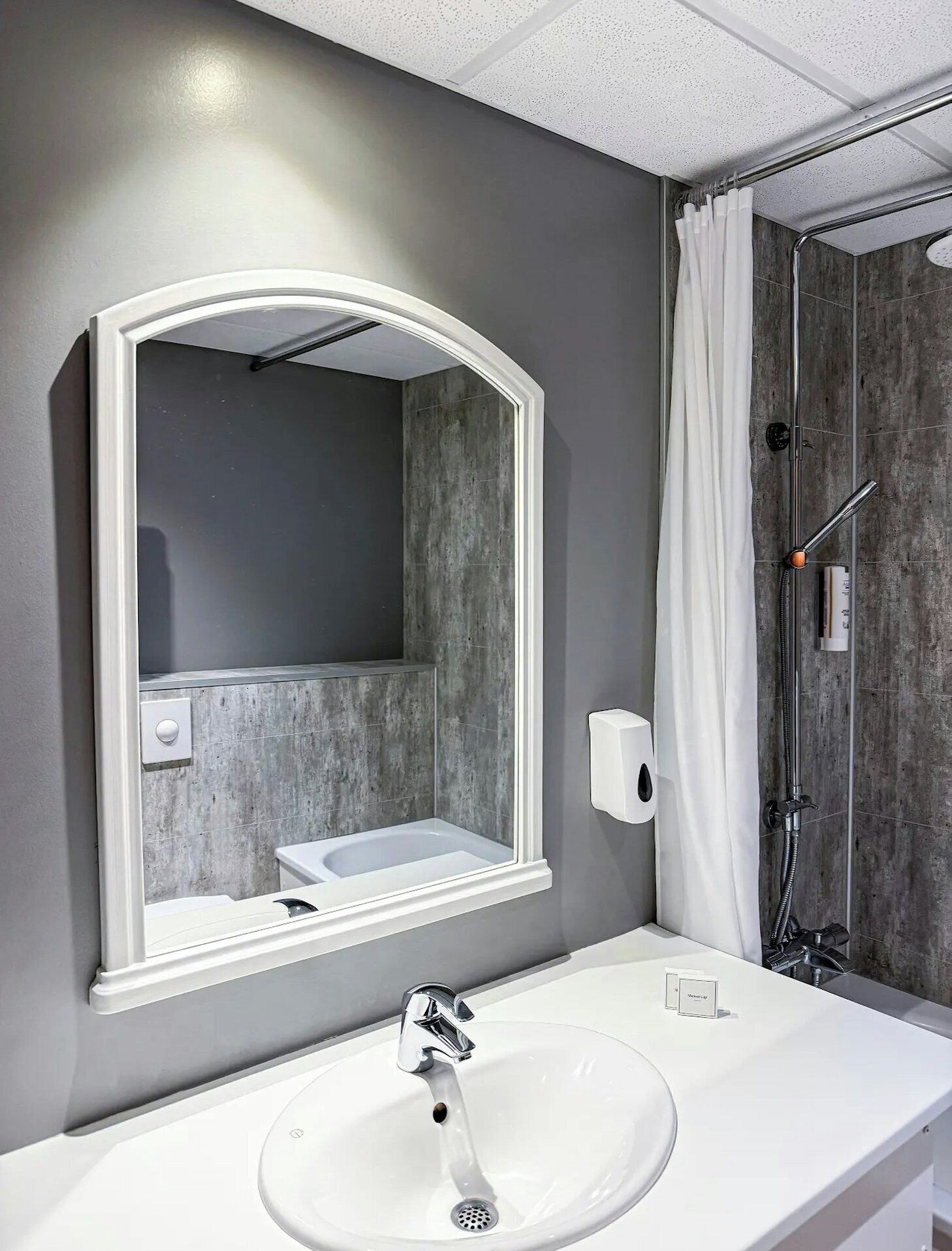 Premium bedding, desk, laptop workspace, soundproofing