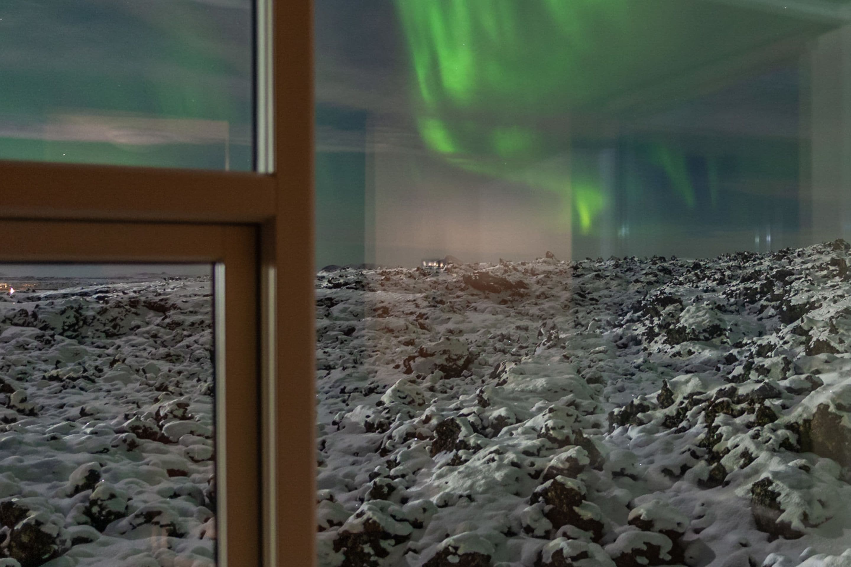 A room with a view of the aurora borealis.