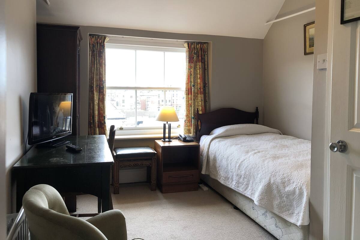 Traditional Single Room | Premium bedding, down comforters, memory foam beds, desk