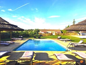 Outdoor pool, pool umbrellas, pool loungers
